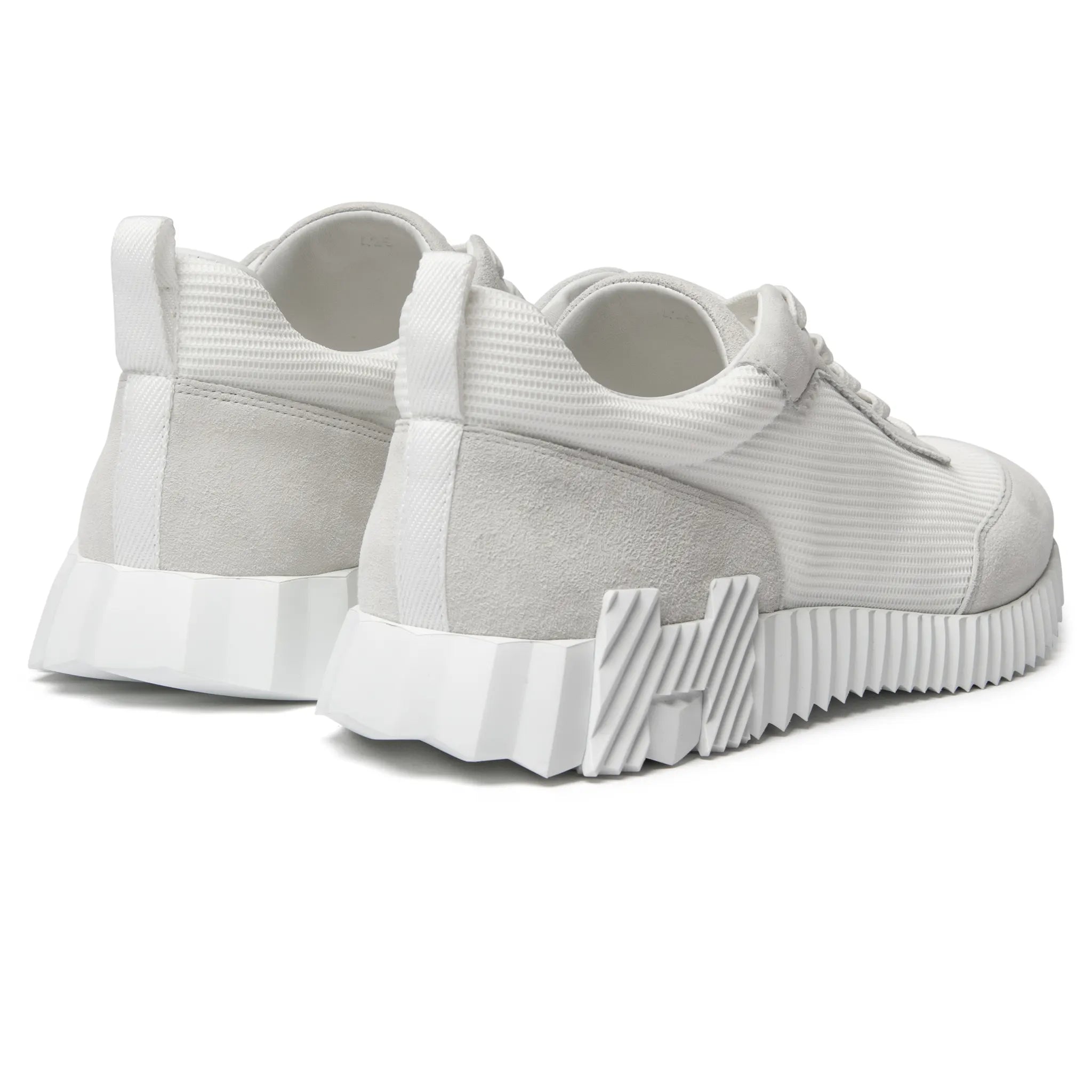 Heel view of Hermès Paris Bouncing Sneaker Triple White